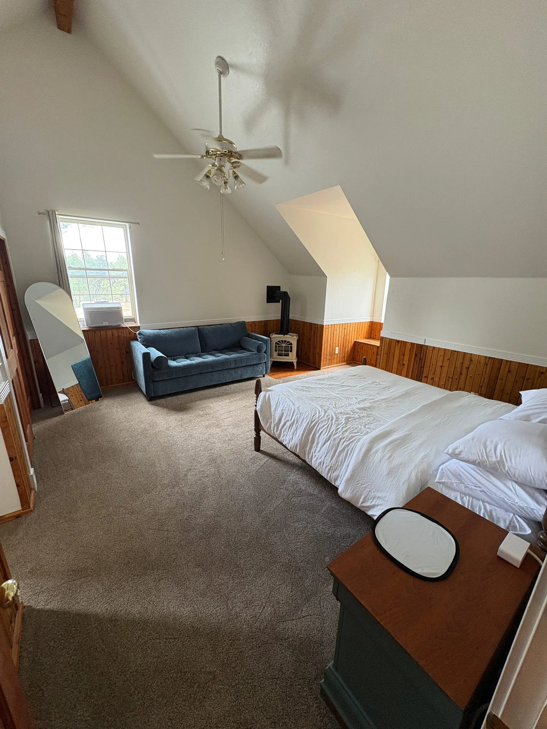 Another angle on Jane’s Room, showing the bed and the seating together.